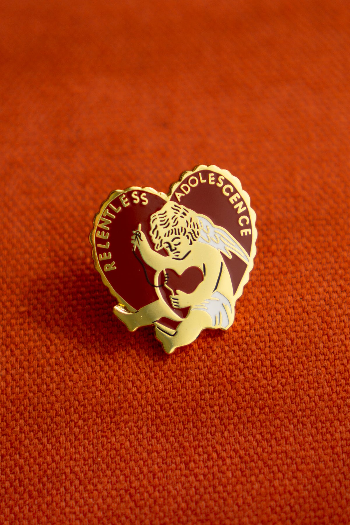 Relentless Adolescence Lapel Pin