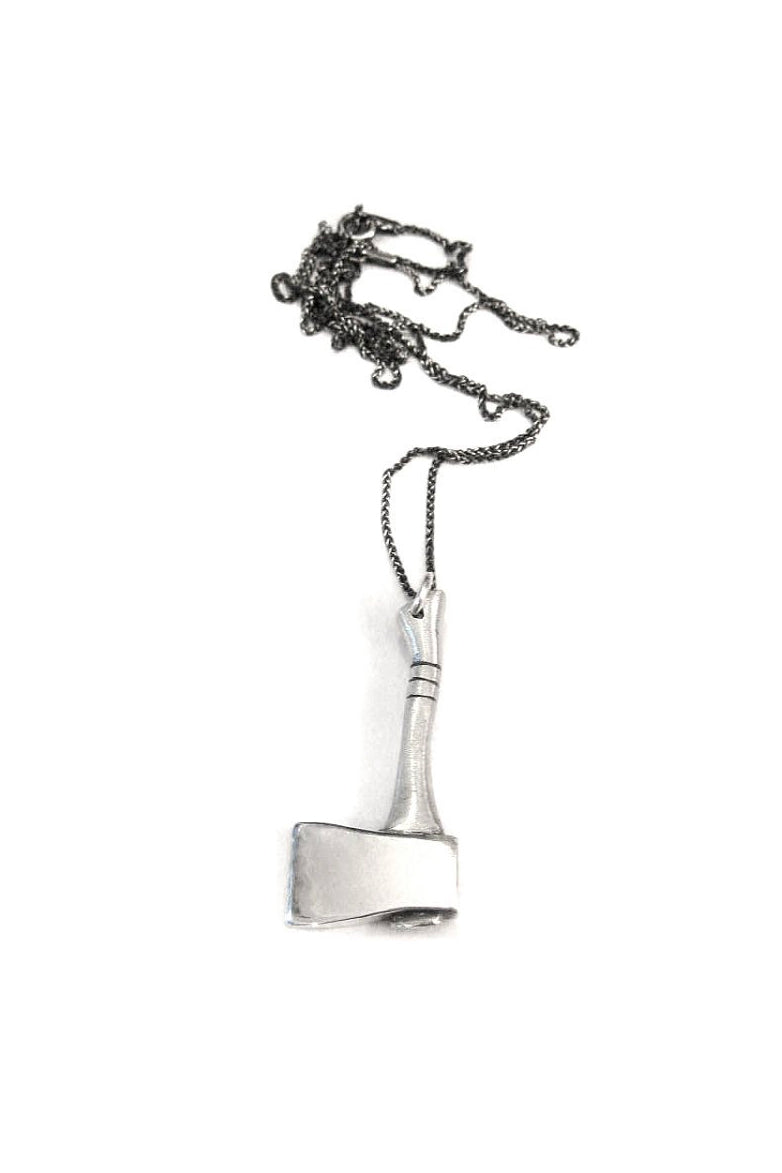 necklace with dark chain and polished silver axe pendant 